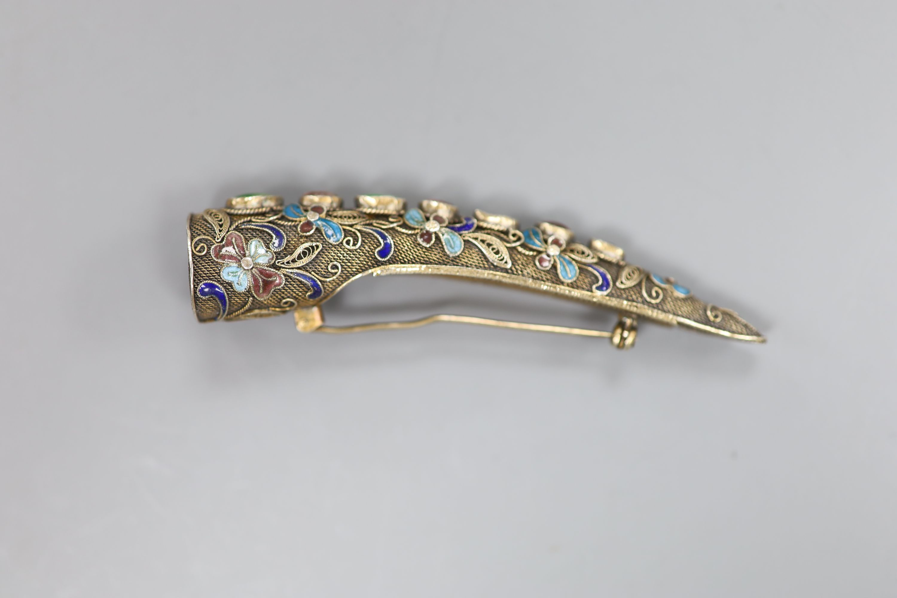 A late 19th/early 20th century Chinese filigree white metal, enamel and gem set nail guard brooch, 85mm.